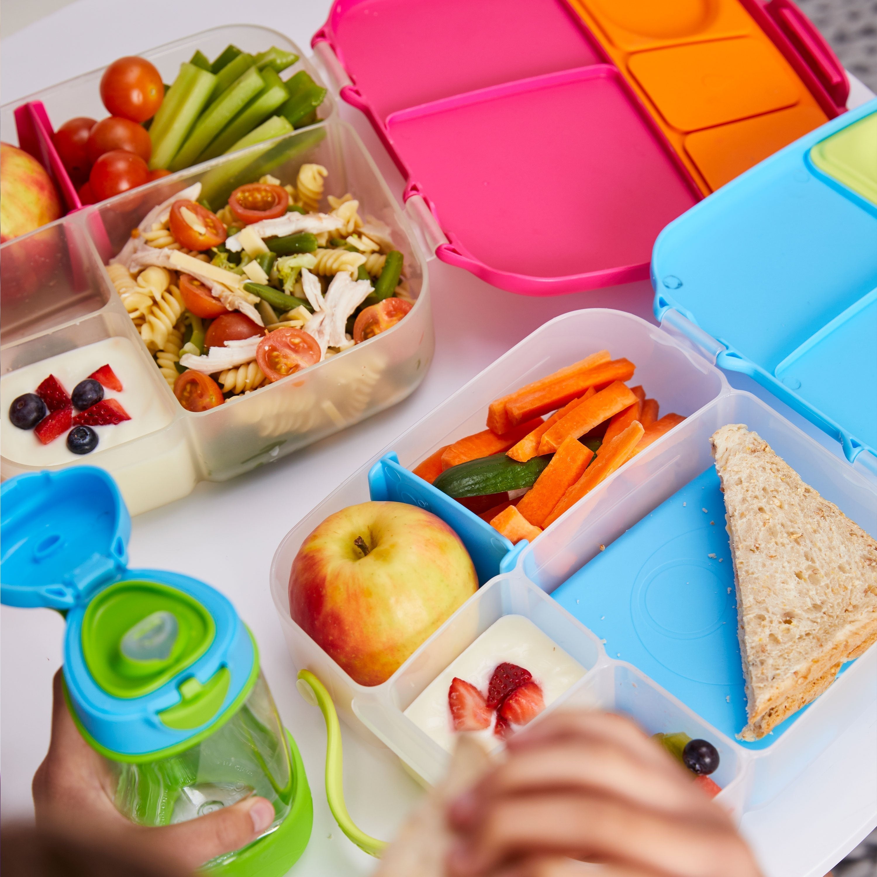 child with lunchbox - strawberry shake - b.box for kids